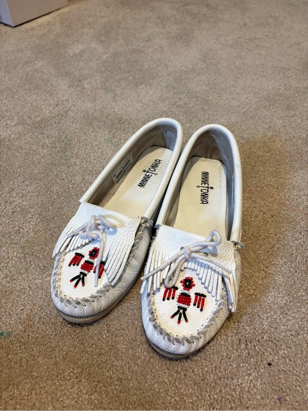 White beaded Minnetonka moccasins